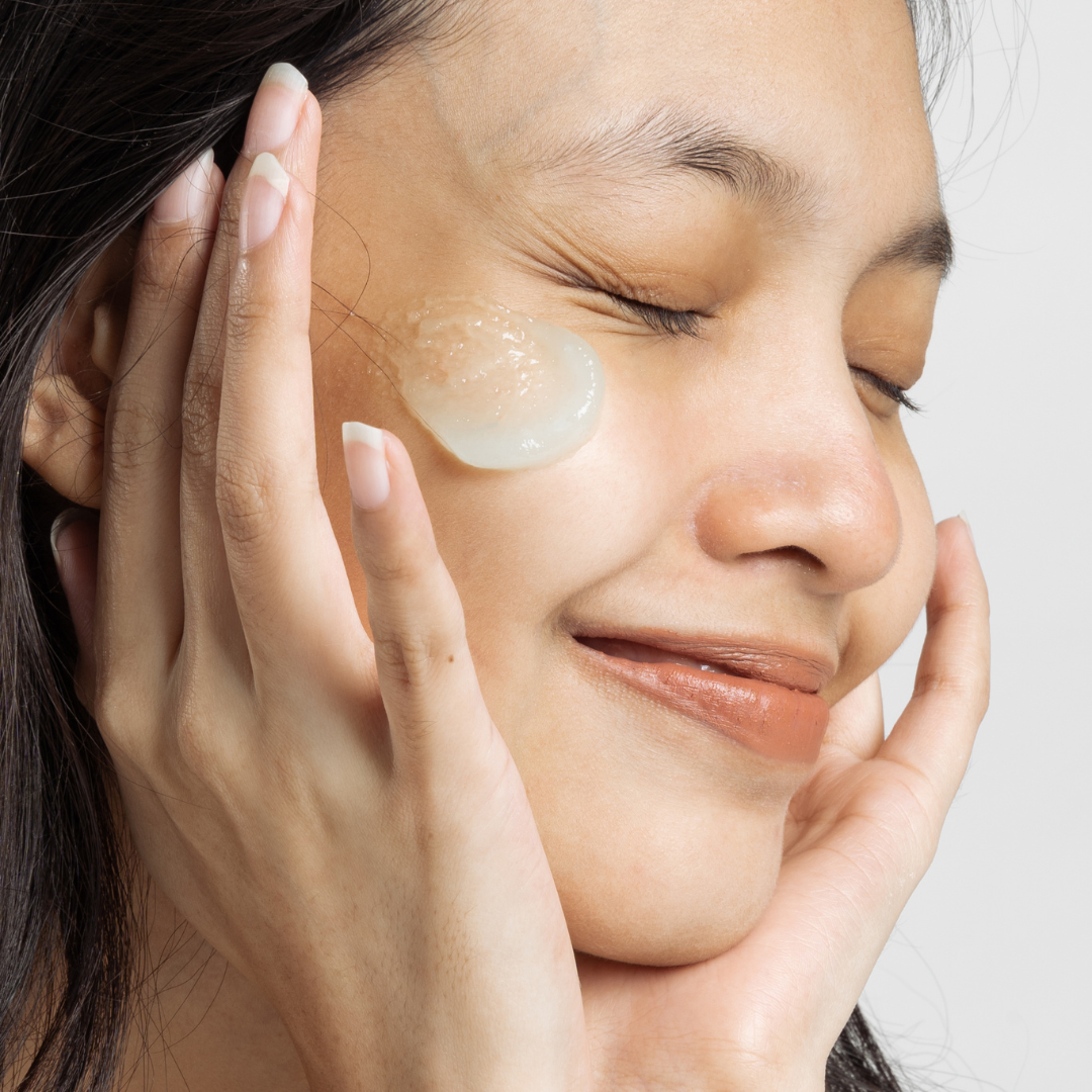 lotion on womans face