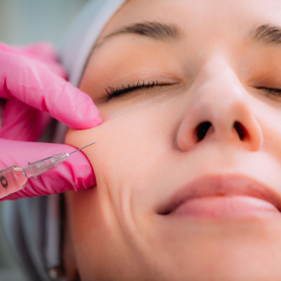Woman getting filler in cheek